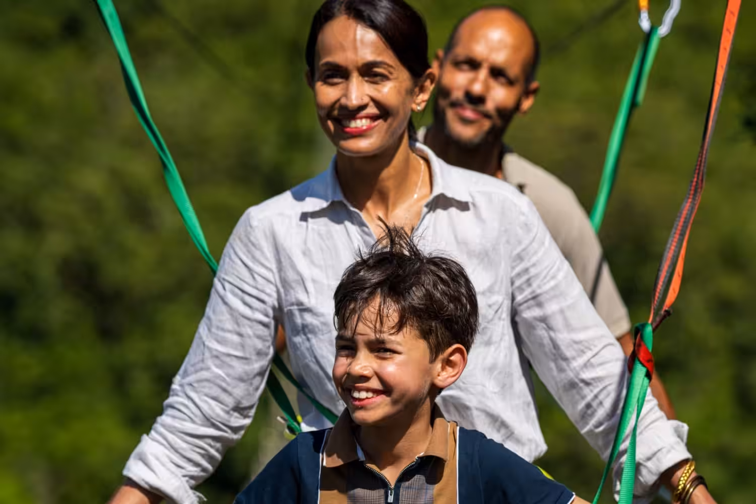 family all smiles in Mauritius trying nepales bridge